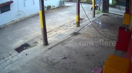 Rider narrowly avoids being crushed when car wash roof collapses