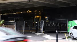 Police officers stationed outside Canary Wharf hotel targeted by anti-migrant protests