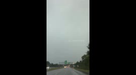Motorist captures impressive lightning strike while driving through Indiana