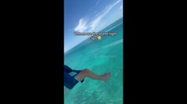Birthday parasailing turns existential as keychain-looking clips spark mid-air panic