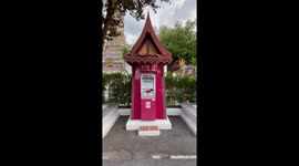 ATMs are housed in mini wooden temples in Bangkok