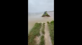 Embankment breaks amid rising river floods in Vietnam