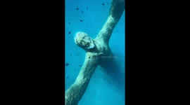 Divers reveal huge underwater Jesus statue looking up at them - 1m views on TikTok