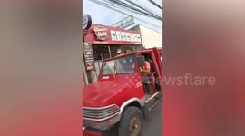 Pet dog sits on bus roof to join driver owner at work