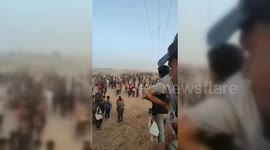 Palestinians Gather To Await Gaza Aid