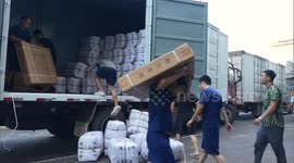 China: First batch of 18,000 relief items allocated in flood-hit Hebei