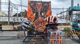 Mural shows President Trump controlling Philippine dictator's son