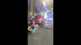 Elderly woman hilariously strikes mannequin on roadside in Jilin, China