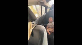Children frightened and crying during automatic car wash in Guangdong, China