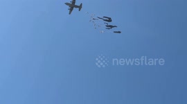 Palestinians rush for airdropped aid amid ongoing Israeli blockade