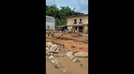 A flash flood destroyed homes and vehicles in northern Vietnam