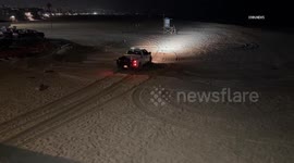 US, Los Angeles: Newport Bech People Swimming And Fishing In Ocean Amid Tsunami Alert