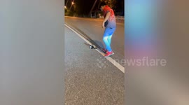 Couple save injured kitten sprawled on road and take him home to recover