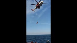 Helicopter performs rescue drills on tanker ship off the coast of Germany