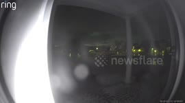 A strange orb floating across my porch.