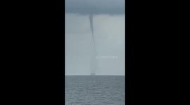 US: Waterspout Seen off North Topsail Beach in North Carolina