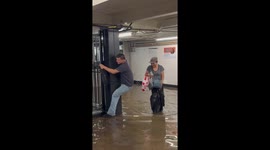 New York floods leaves passengers trapped at subway station in Brooklyn