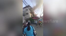 Four trapped in shophouse fire rescued on outskirts of Bangkok