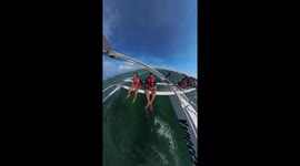 Catamaran ride goes wrong when net plunges couple into sea