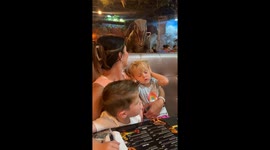 Kids hilariously freak out over velociraptor at Dinoland — family dinner turns prehistoric