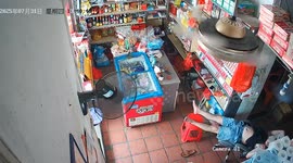 Man startled by snake inside store in Guangdong, China