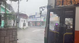 Flooded golf course and halted buses in Shek O, Hong Kong