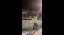 Comical fall highlights the challenges of first-time ice-skater on slippery rink