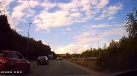Dashcam - Dangerous Driving. Maniac in Citroen C4 undertakes and aggressively cuts up dashcam driver, forcing him to brake, before cutting back in and undertaking further vehicles.