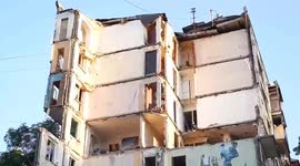 Zelenskyy visits site of Russian attack in Kyiv, honors '31 victims'