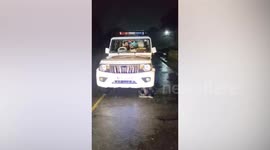 Python slithers out of police mobile patrolling in village