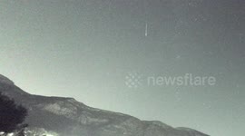 Serpentine fireball flashes across night sky above Spain