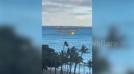 Person seen paddleboarding during Tsunami alert in Hawaii