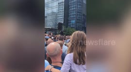Ozzy Osbourne fans in Birmingham climb up lampposts to get a better view of cortege