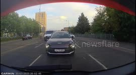 White Mercedes makes poor decisions with police car approaching.