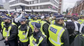 Police separate protesters at an anti immigration demonstration.