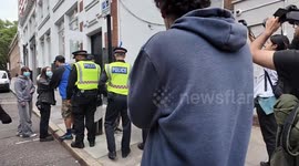 Police do their best to disband the pro illegal immigrant supporters outside the Thistle Hotel near Old Street