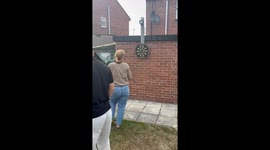 Dare goes horribly wrong when son throws dart into mum's hand