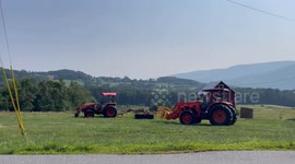 Tractors for hay harvest in Pownal Vermont on this cool Sunday