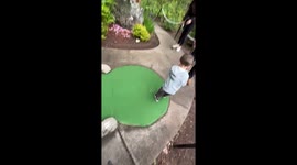 Boy sinks perfect bounce shot at mini golf course in Berlin, Connecticut