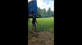 Golfer loses balance after powerful swing in Muskegon, Michigan, USA
