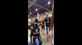 Robot at  event makes uncomfortable interaction with attendee in Las Vegas, Nevada, USA