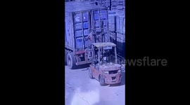 Worker's last-gasp escape as cargo topples out of truck's door