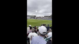India v England 5th Cricket Test Match day 4 at the Oval during rain delay, stewards jumping over rope to loud cheers from the crowd as the rope is moved round the ground to soak up water