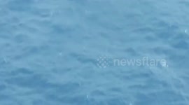 Philippines Coast Guard aircraft warns Chinese research vessel during patrol