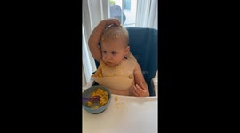 My son enjoying his supper