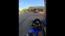 Motorcyclist Lets Kid Rev His Engine