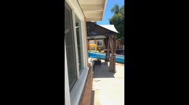 Dad Attempts to Slip and Slide