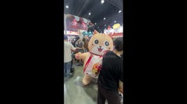 Inflatable animal mascots dance at pet show in Thailand