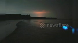 Incredible photos show bioluminescent plankton below the Milky Way