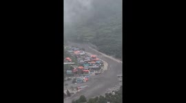Homes flattened as flood crashes down mountainside leaving dozens feared dead